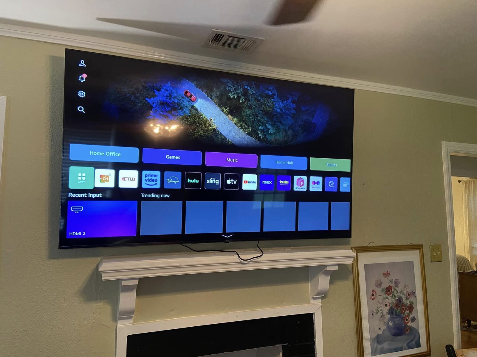 TV wall mounting above a fireplace
