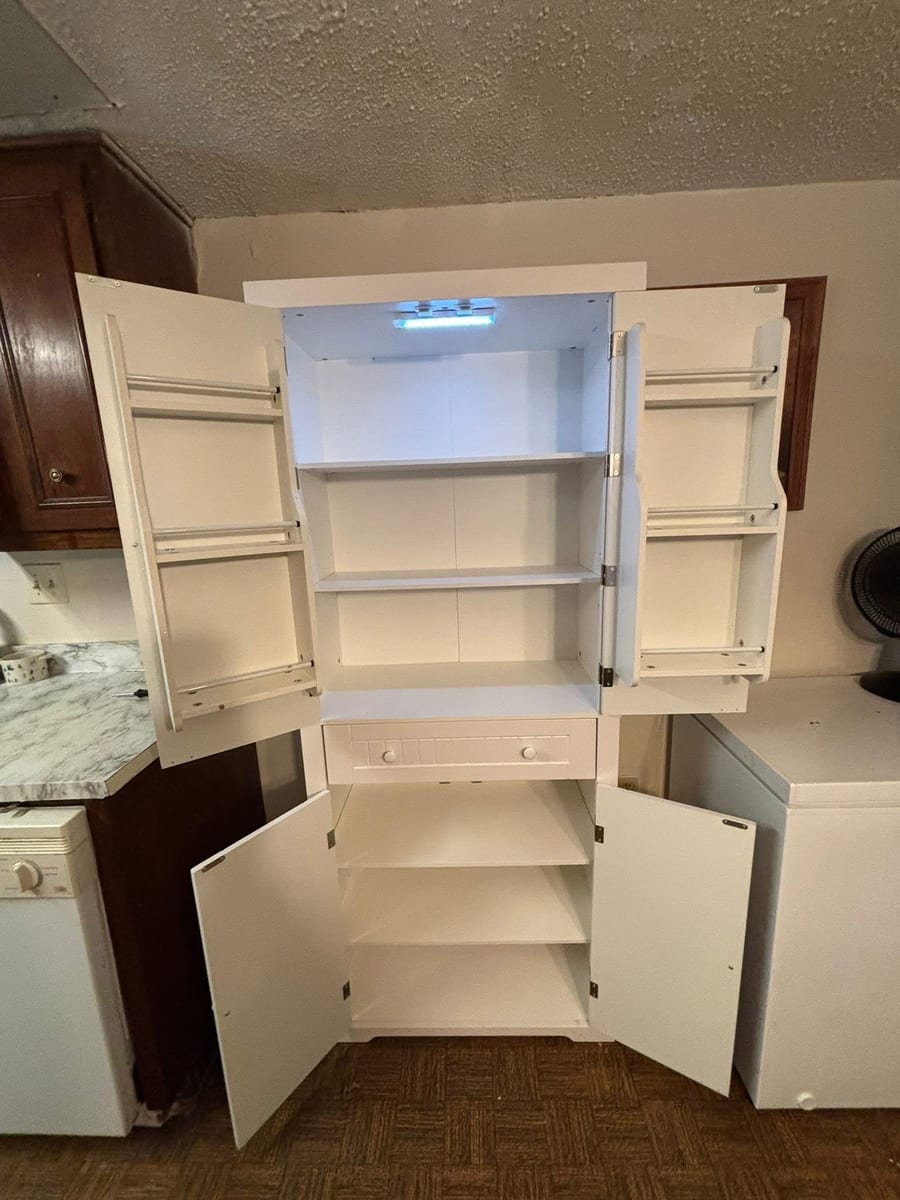 Pantry cabinet and shelving assembly